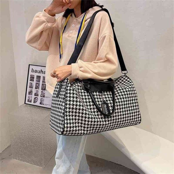 

travel bag women's large capacity hand light boarding luggage waiting for delivery fitness bags