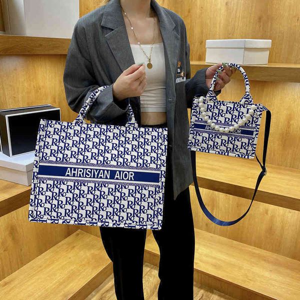 

2022 new designer handbags bags canvas capacity portable foreign style ins one