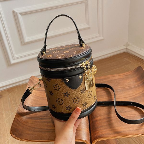 

bucket bag bag hairy rice small handheld shoulder crossbody cylindrical female