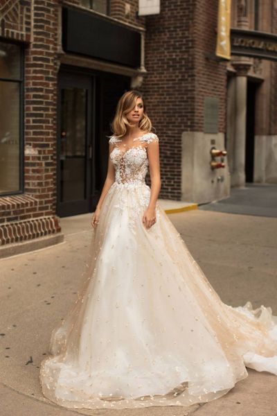 

gorgeous a line wedding dresses champagne dubai sweep train bridal gowns lace applique beads beach robe de mariÃ©e, White