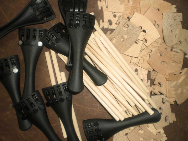 

10 pcs violin bridge 4/4+ 10 pcs carbon fiber tail piece 4/4 + 20 pcs violin sound post