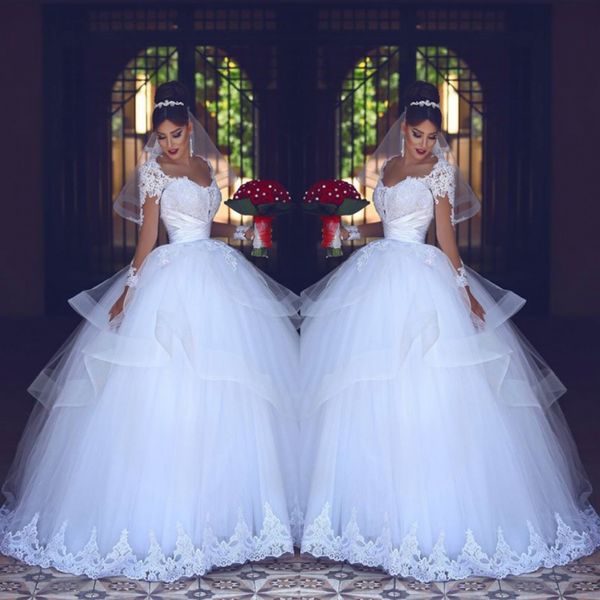 Abito da ballo romantico Abiti da sposa Pizzo bianco Sheer maniche lunghe Abiti da sposa Tulle Abiti da sposa arabi sauditi su misura