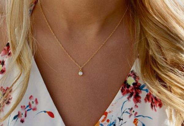

gold and silver clavicle necklace with single diamond pendant, with alloy material, very but hign quality, ing
