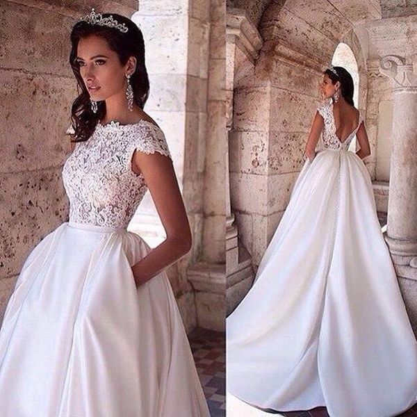 

vintage 2019 white princess wedding dresses with pockets lace appliques boat neck capped sleeves backless bridal gowns with sweep train