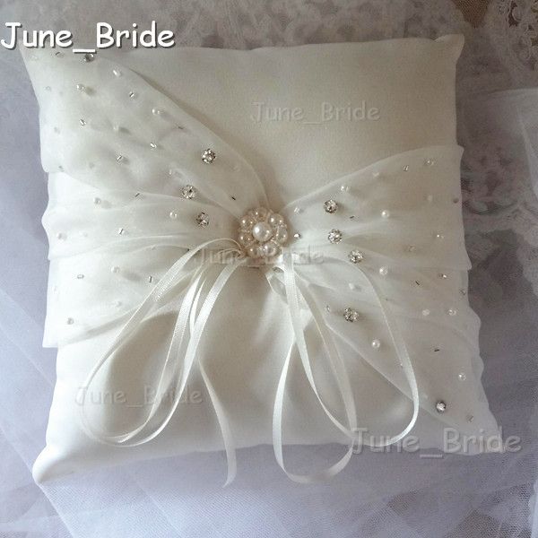 

Descansos do anel e cestos de flores june_bride