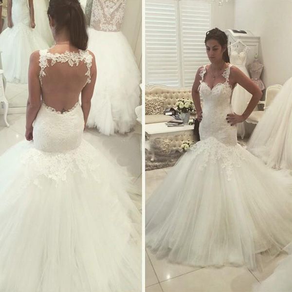 Abiti da sposa a sirena con vestibilità e svasatura sexy Tromba con scollo a cuore Cinghie in pizzo Abiti da sposa in tulle con applicazioni sul retro di alta qualità