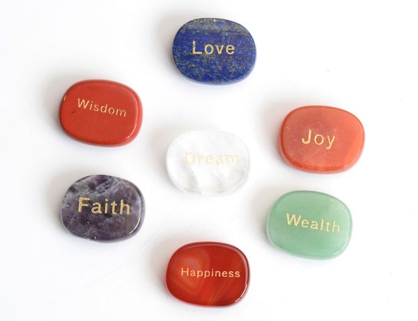 

7 pieces natural chakra stones engraved inspirational positive word palm stones with a pouch