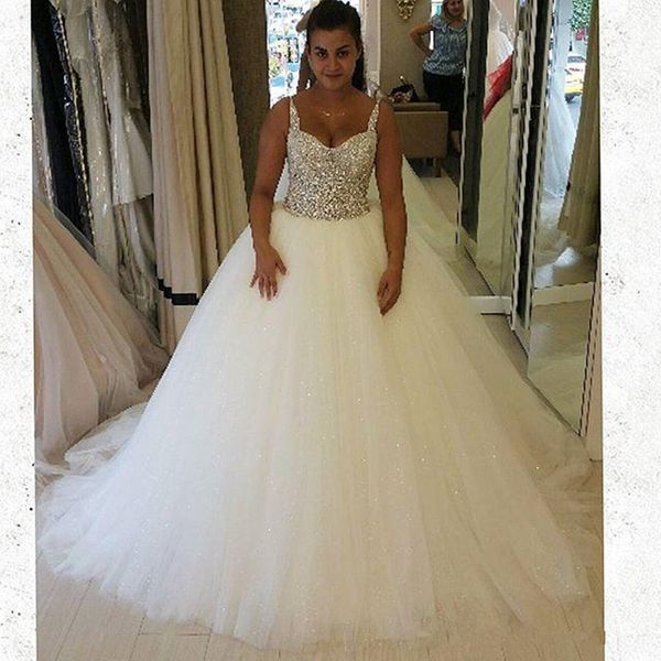 

gorgeous design ball gown sparkling wedding dress spaghetti straps crystals sequins tulle luxury bridal gowns custom size, White