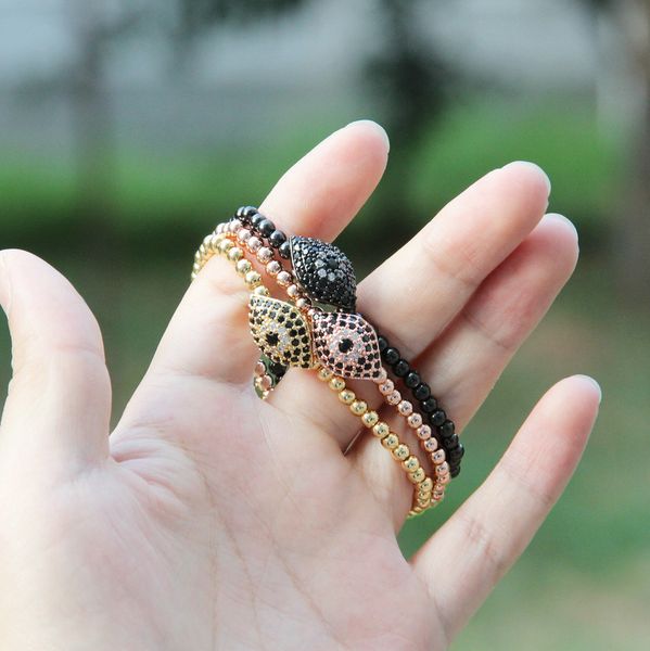 

1 pcs high grade mens jewelry 4mm copper beads with black cz turkish lucky eye elastic bracelets, Golden;silver