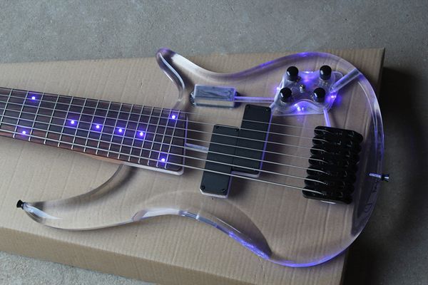 Seltener E-Bass mit 7 Saiten, Acrylkorpus und blauem LED-Licht, Ahornhals, Palisandergriffbrett, Aktivkabel, 9-V-Batteriekasten, schwarze Hardware
