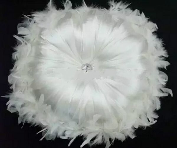 

wholesale-#577 faux silk fabric exquisite feather around diamond on the middle. round cushion with filling hipping min order 1pcs