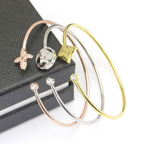 

Titanium teel jewelry whole ale four leaf flower ingle drill curved bracelet female three piece four leaf flower ingle drill bracelet, Black