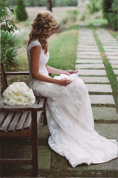 

designer mermaid lace wedding dresses 2016 with cap sleeves back hollow v neck graden wedding gowns appliques lace bridal dress, White