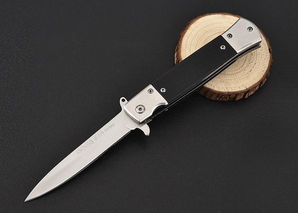 sog stilleto folding blade sharp knife skid resistant covered handle