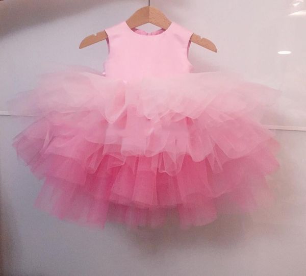 Abiti da ragazza di fiori in tulle dal design semplice ed economico Abito da ballo per ragazze Abito da spettacolo Blush Abiti formali per matrimoni in spiaggia