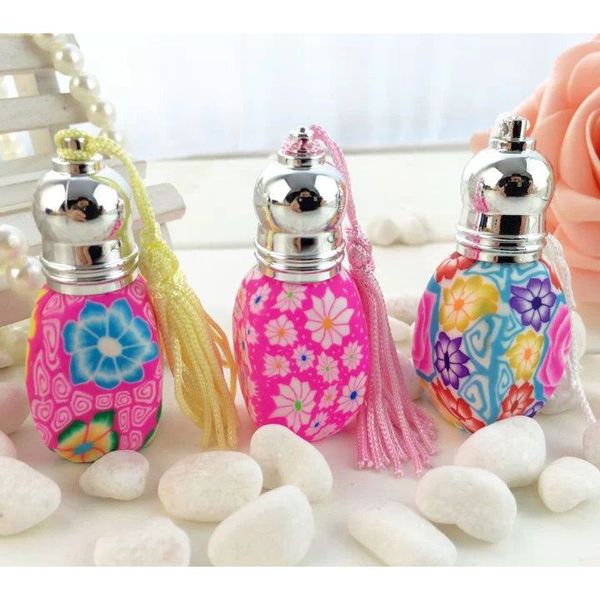 

5ml beautiful color floral roller perfume bottle color tassel decor refillable empty bottle for women new brand 50pcs/lot fz324