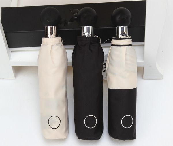 

Luxury novelty item para ol cla ic camellia flower logo umbrella for women 3 fold luxury umbrella with gift box and bag rain umbrella