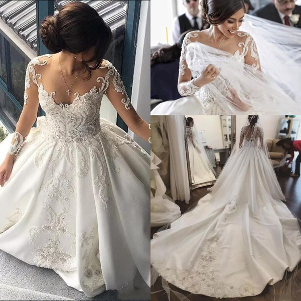 

2017 luxury a line wedding dresses sheer neck long sleeves lace appliqued beaded cathedral train bridal gowns vintage wedding gowns, White