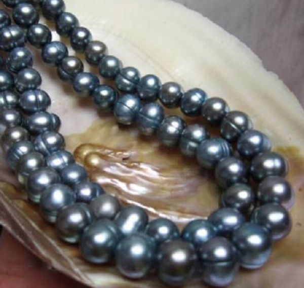 

charming 34" tahitian 10-11m black baroque pearl necklce, Silver