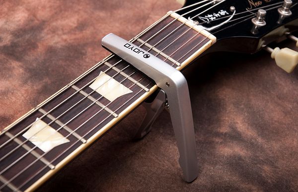 

jcp-01 colorful plastic guitar capo for 6 string guitars black silver wood colors with,mini guitar picks