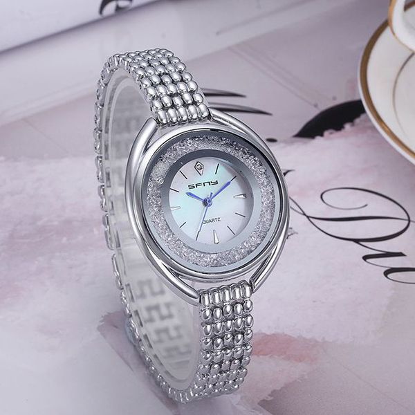 

2017 new fa hion luxury de ign women watch dre tainle teel quartz watch montre clock relogio reloje de marca wri twatche whole ale, Slivery;brown