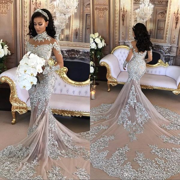 

Elegant Arabic Long Sleeve Lace Wedding Dresses High Neck Appliques Beaded See Through Skirt Plus Size Wedding Dress Long Train Bridal Gowns