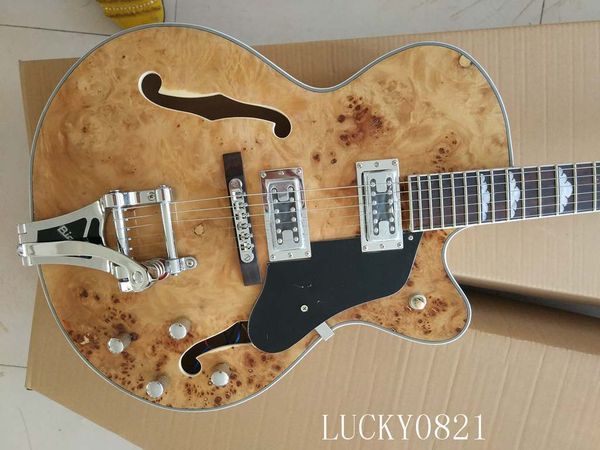 

The factory cu tom guitar the original wood color big jazz ro ewood fingerboard but change a required