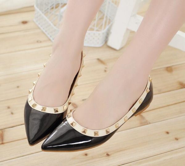 

Spring autumn new female shoes in Europe and the rivet shoes pointed flats shallow single mouth