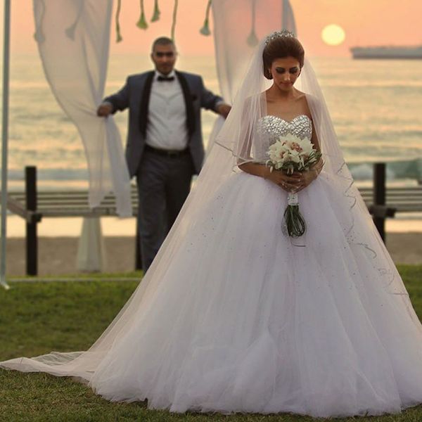 

sparkly luxury crystals arabic ball gown wedding dress sweetheart sleeveless beads sequins puffy tulle bridal gowns, White