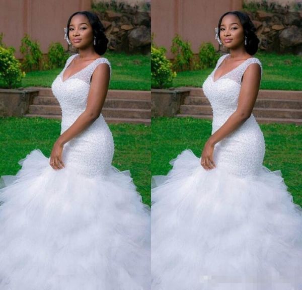 

Арабский стиль Свадебные платья больших размеров 2019 Глубокий V-образным вырезом бисером Слои Русалка Часовня Поезд на шнуровке Назад Пляжные свадебные платья на заказ