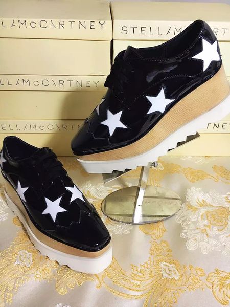 

stella elyse mccartney shoes black mirror leather white star white sole wedge platform nina