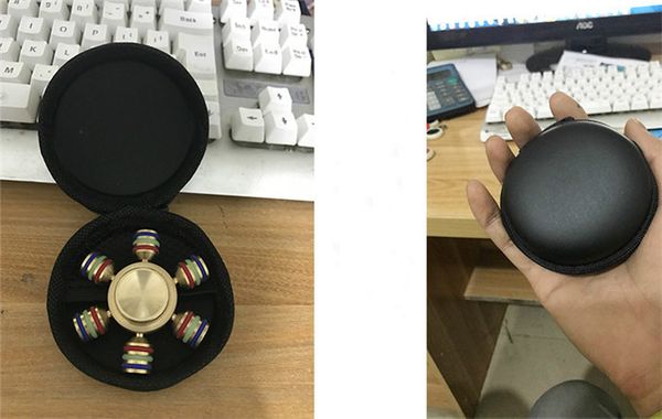 

Dhl fingertip gyro box for fidget hand pinner circle round finger toy black bag box carry ca e packet protect urface again t abra i jc289