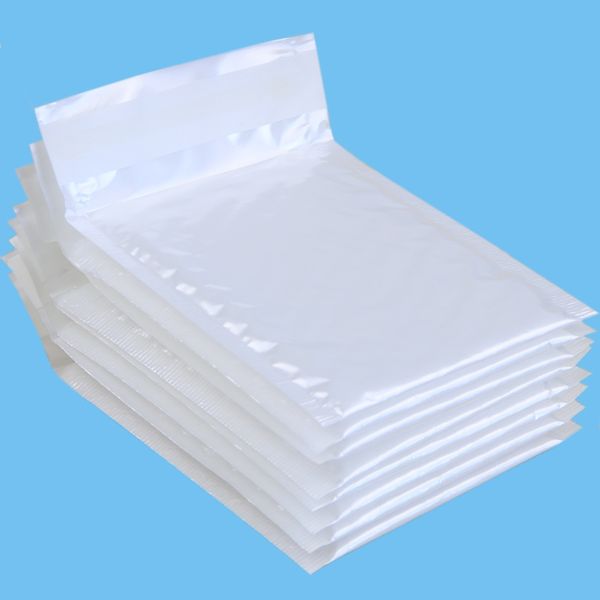 Atacado- (110 * 130mm) 10 pçs / lotes Mailers Bubble Envelopes acolchoados Embalagens de embalagem Bolsas de envio Kraft Mailing Envelope Envelope