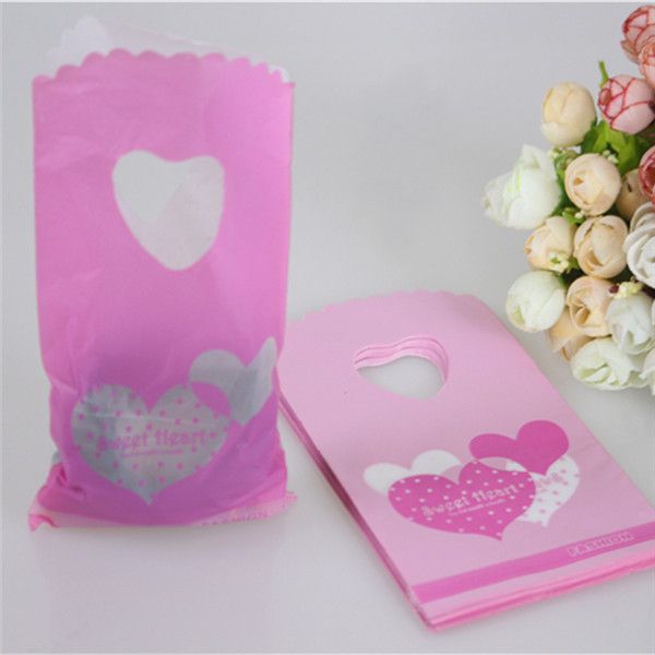 

wholesale- new style wholesale 50pcs/lot pink sweet heart gift packaging bags plastic gift pouches lovely mini gift bags