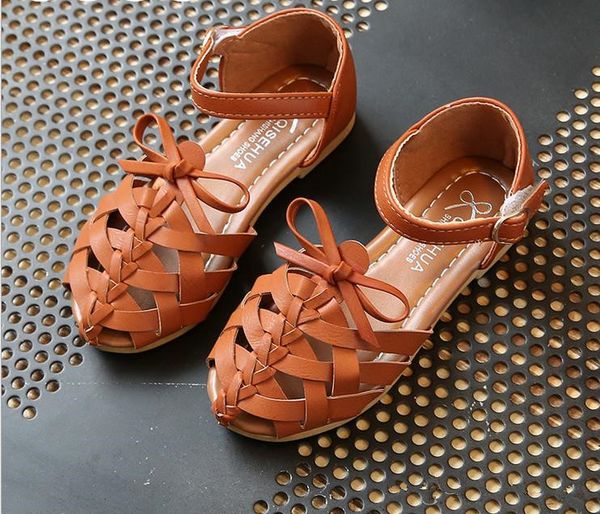 

Girl hollow out andal children hollow weave tar andal girl bow buckle hoe kid pu leather hoe kid beach prince footwear