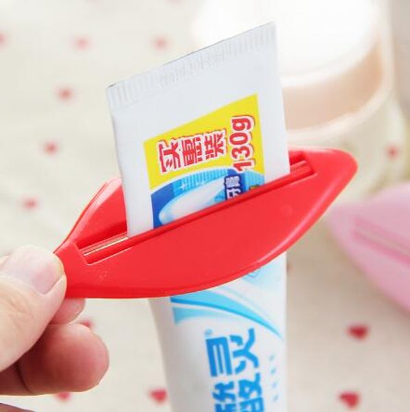 

practical multifunction creative red lips toothpaste dispenser sealing clip peelers home bathroom tool