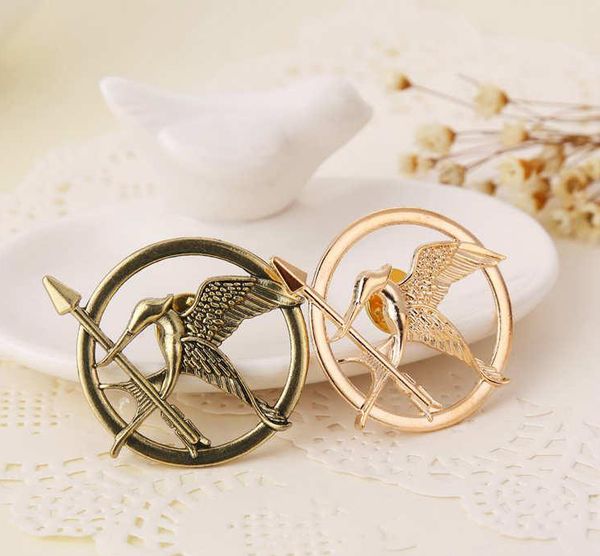 

the hunger games brooches inspired mockingjay and arrow brooches pin corsage gold bronze silver, Gray