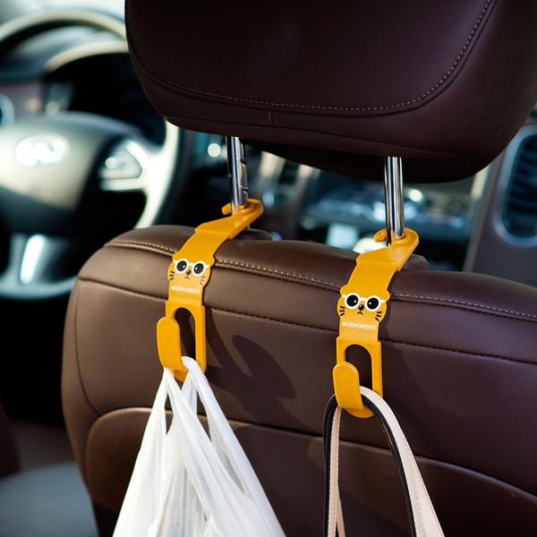 

wholesale- 2pcs cartoon car back seat headrest hanger holder hooks for bag purse cloth grocer auto fastener car back seat clip clasp