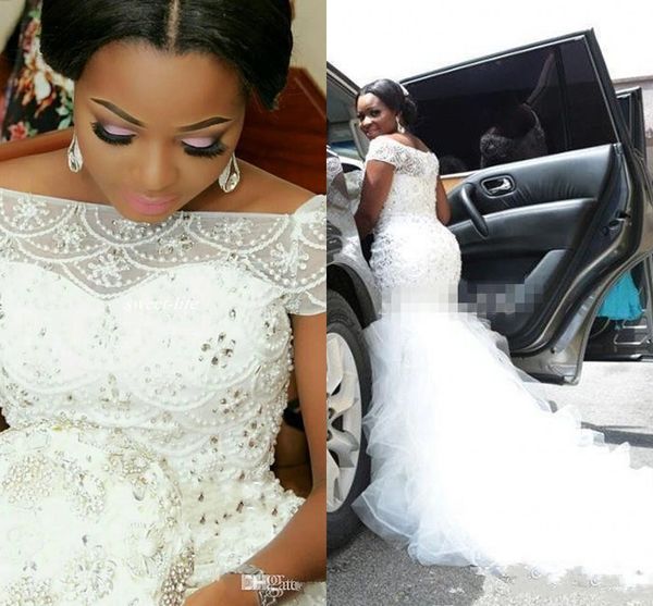 

2020 arabic nigerian mermaid wedding dresses off shoulder beading tiered rullffes short sleeves chapel train tulle plus size bridal gowns, White