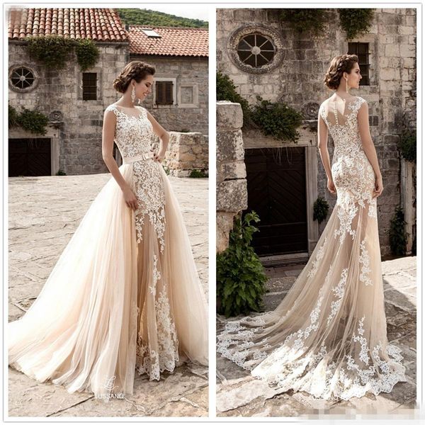 

Milla nova 2019 champagne lace mermaid wedding dre e heer neck cap leeve tulle applique a line court train wedding gown with over kirt