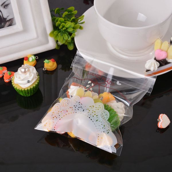

wholesale- 50pcs "handmade" letter lace pattern pp self adhesive seal plastic bags cookie storage gift package 2016 new 14cmx10cm