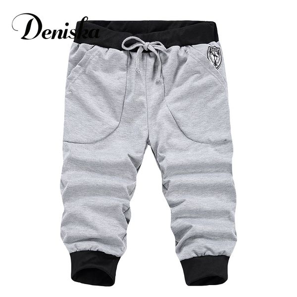

wholesale- 2016 summer men's casual cotton white calf-length black men's straight type large size loose shorts size xxxl, White;black
