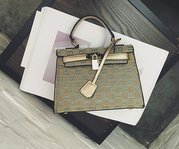 

2017. small. lock catch. tassels. canvas. handbag. women's bags. fashion leisure bag. medium-sized. soft.cross body.shoulder bags.totes