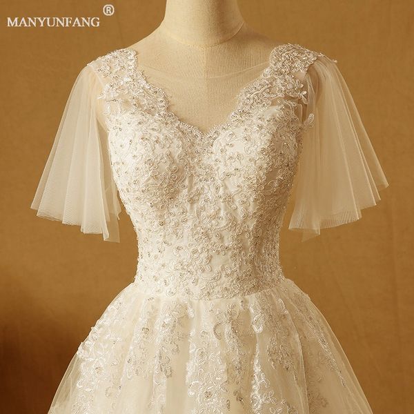 

2020 new design a line lace bridal gowns appliques lace court train dubai illusion sheer bridal gowns short sleeves princess wedding dresses, White