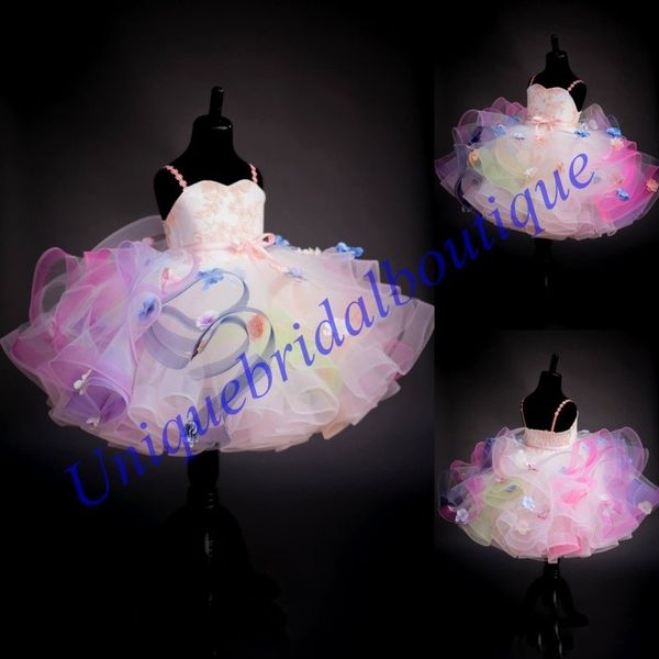 Kurze Regenbogen-Festzugkleider für kleine Mädchen 2019 mit 4 mehrfarbigen Rüschenrock, handgefertigten Blumen, hübsches süßes Mädchen-Geburtstagskleid