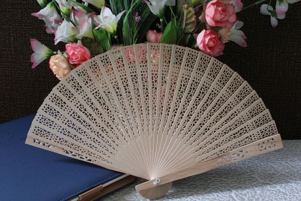 

100pcs/lot Free shipping design Chinese handcraft sandalwood hand fan,wedding gifts Fast shipping and Delivery