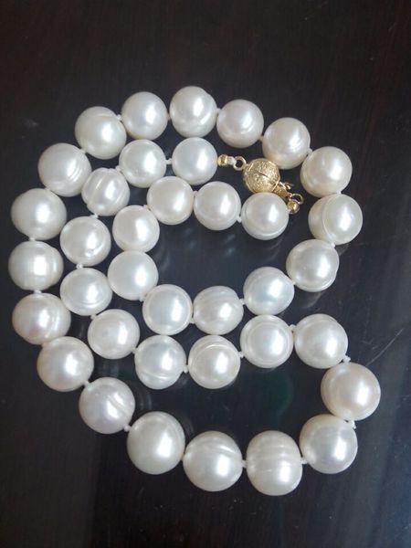 

fine 20" 11-12mm japanese white pearls necklace 14k, Black