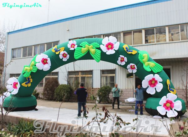 Schöner 10 m großer Blumenbogen, aufblasbarer Blumenranken-Torbogen, grüne, gebogene Bogentür mit Schmetterlingen für Pflanzenveranstaltungen