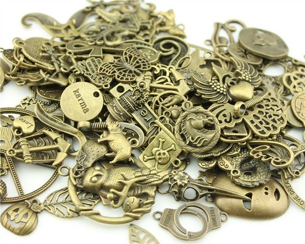 

wholesale- random mix styles 50g (about 20~50pcs) antique bronze color zinc alloy charms (you may get some charms not in the picture, Bronze;silver