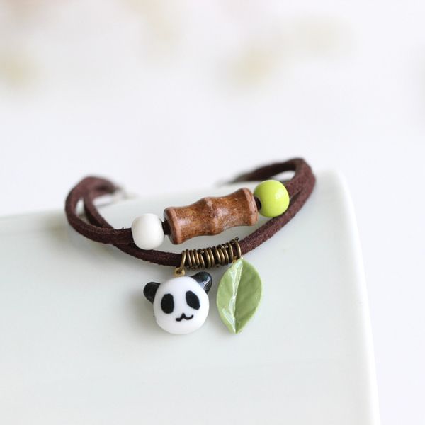 Atacado-novo Chegada artesanal panda exclusiva pulseiras cerâmicas pulseiras moda fita elegante jóias para as mulheres